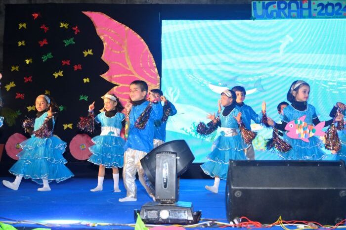 Colorful dance performance on stage.