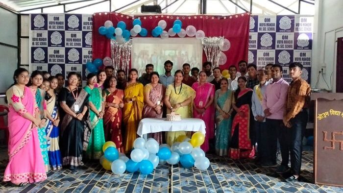 Group celebration with colorful decorations.